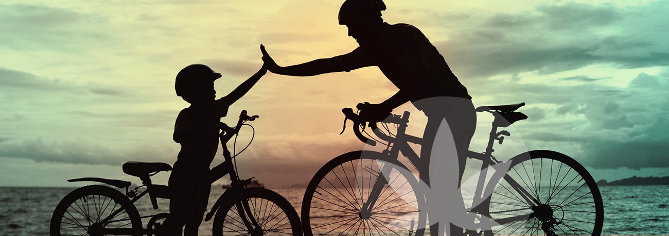 father and son biking